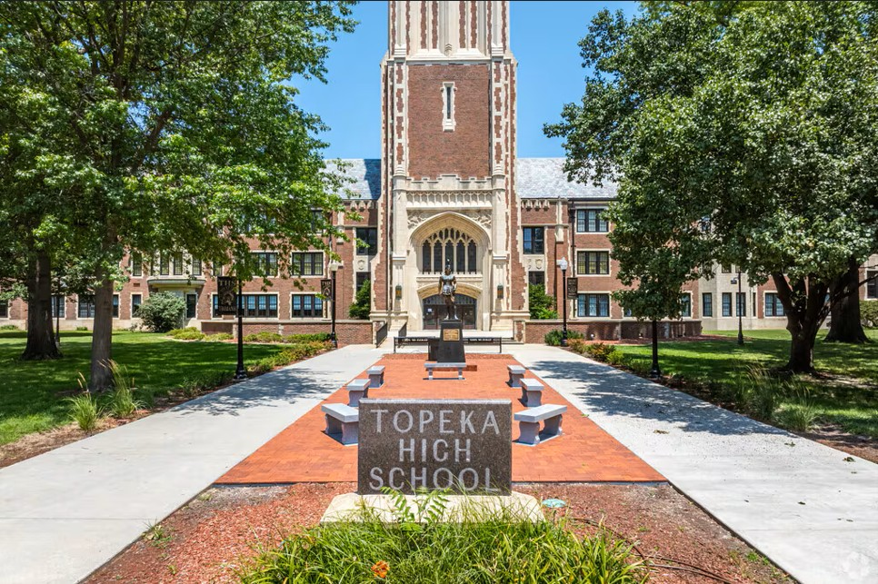 Topeka high school sign and school