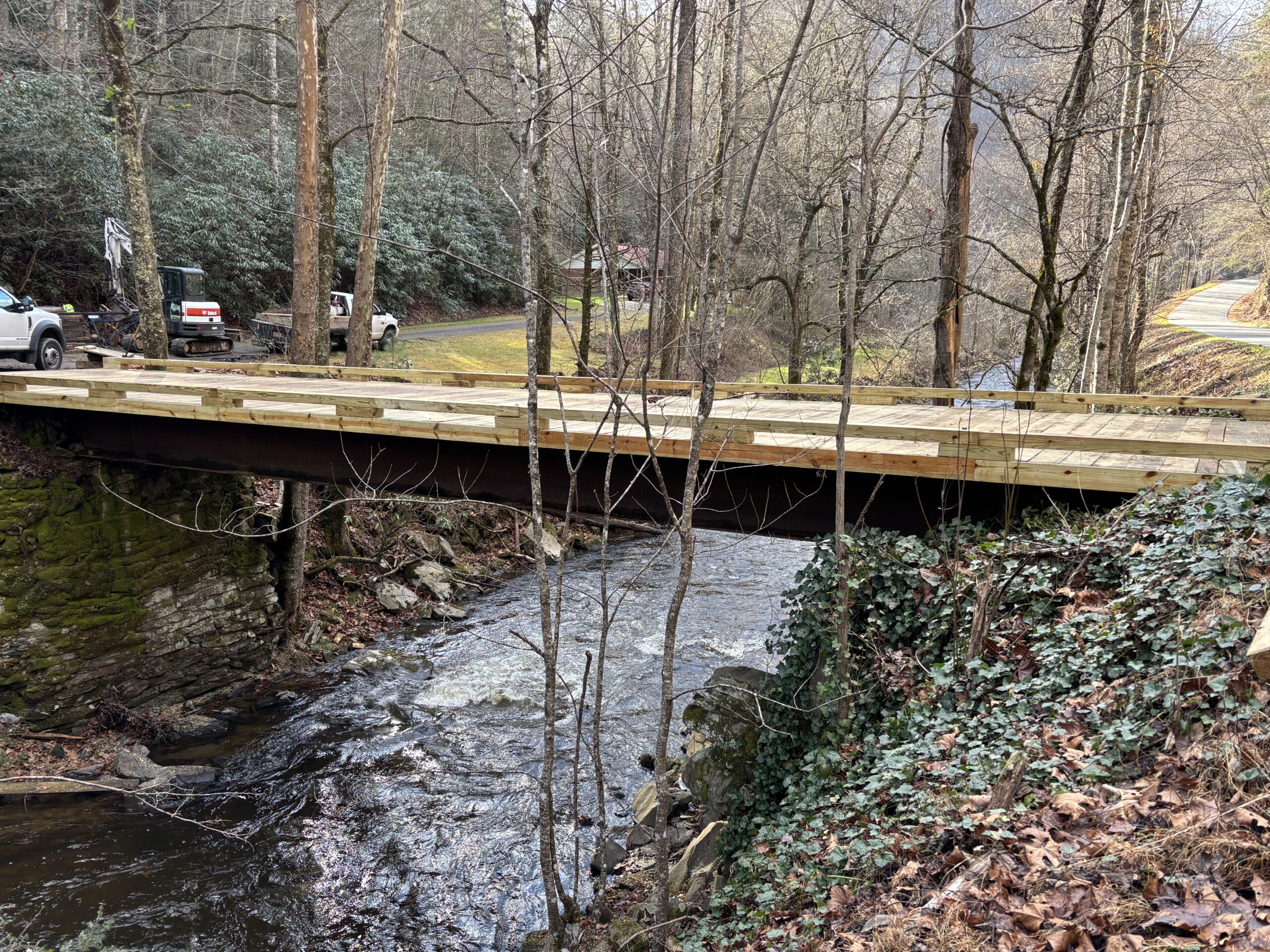 Custom bridge construction over a mountain creek in Western North Carolina