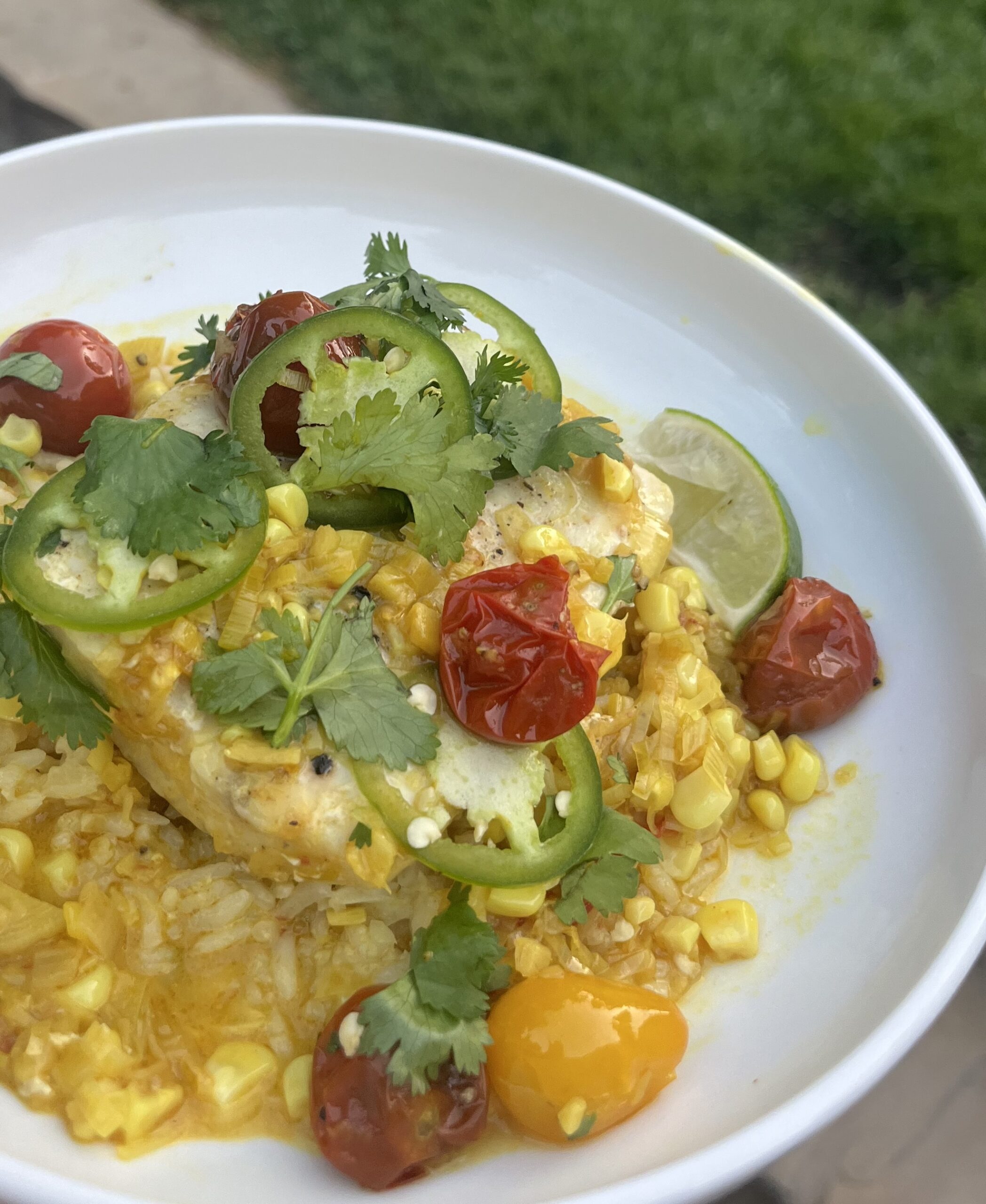 Mahi Mahi with Creamy Coconut Corn and tomatoes