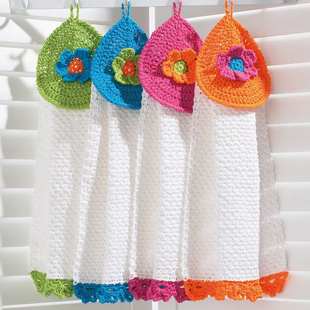 Image is of the knit kitchen towel top. 6 Towel Topper Free Crochet Pattern