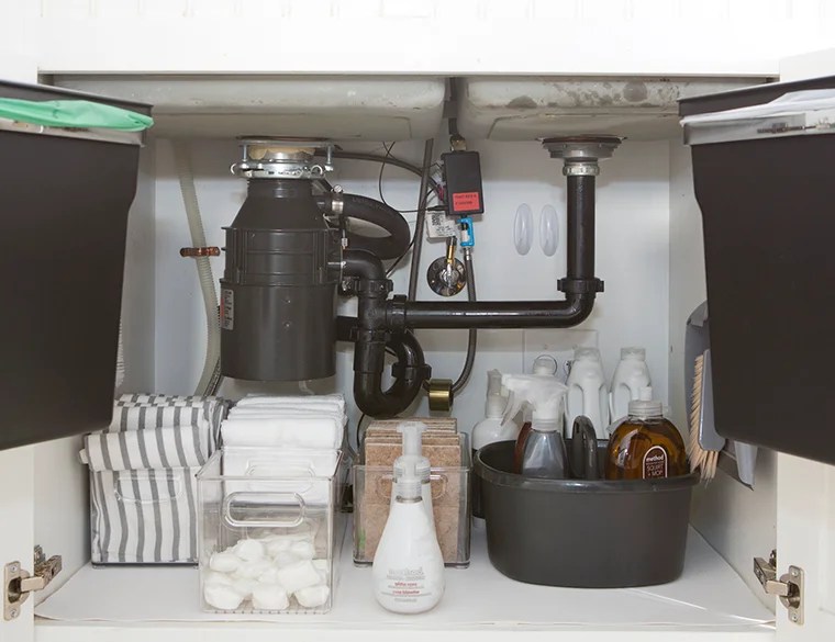 Decluttering and organizing the kitchen sink area and cabinets with copycatchic and @methodhome minimalist home luxe living for less