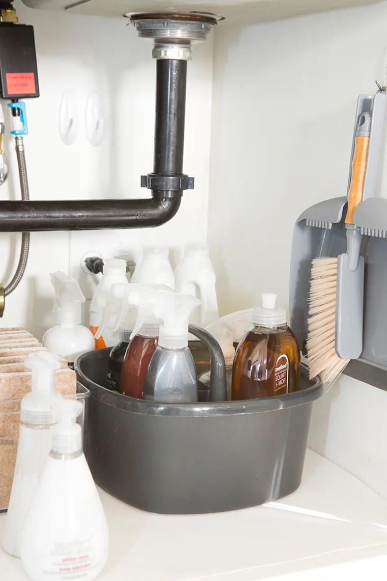 Decluttering and organizing the kitchen sink area and cabinets with copycatchic and @methodhome minimalist home luxe living for less