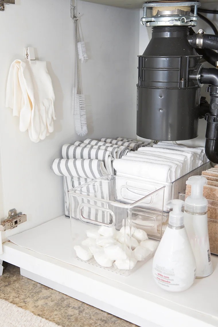 Decluttering and organizing the kitchen sink area and cabinets with copycatchic and @methodhome minimalist home luxe living for less