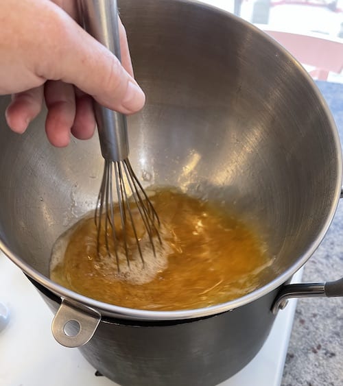 whisk egg whites, honey and sugar