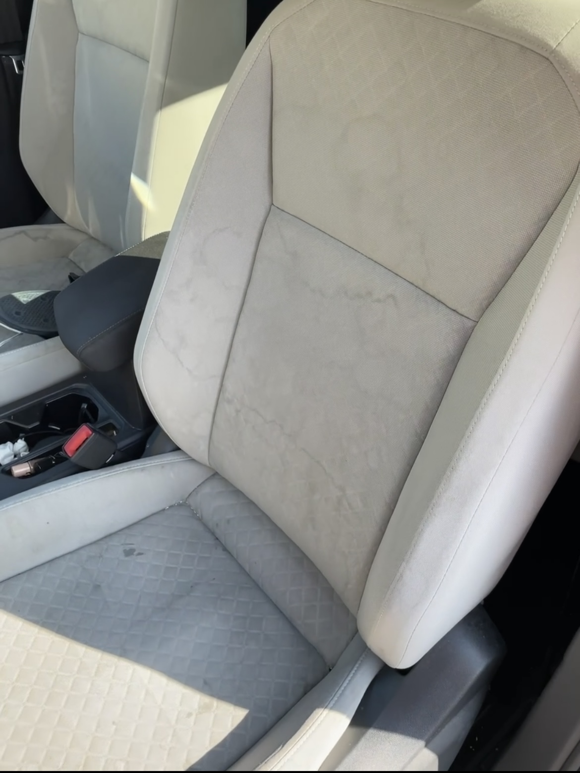 Car seat before interior cleaning