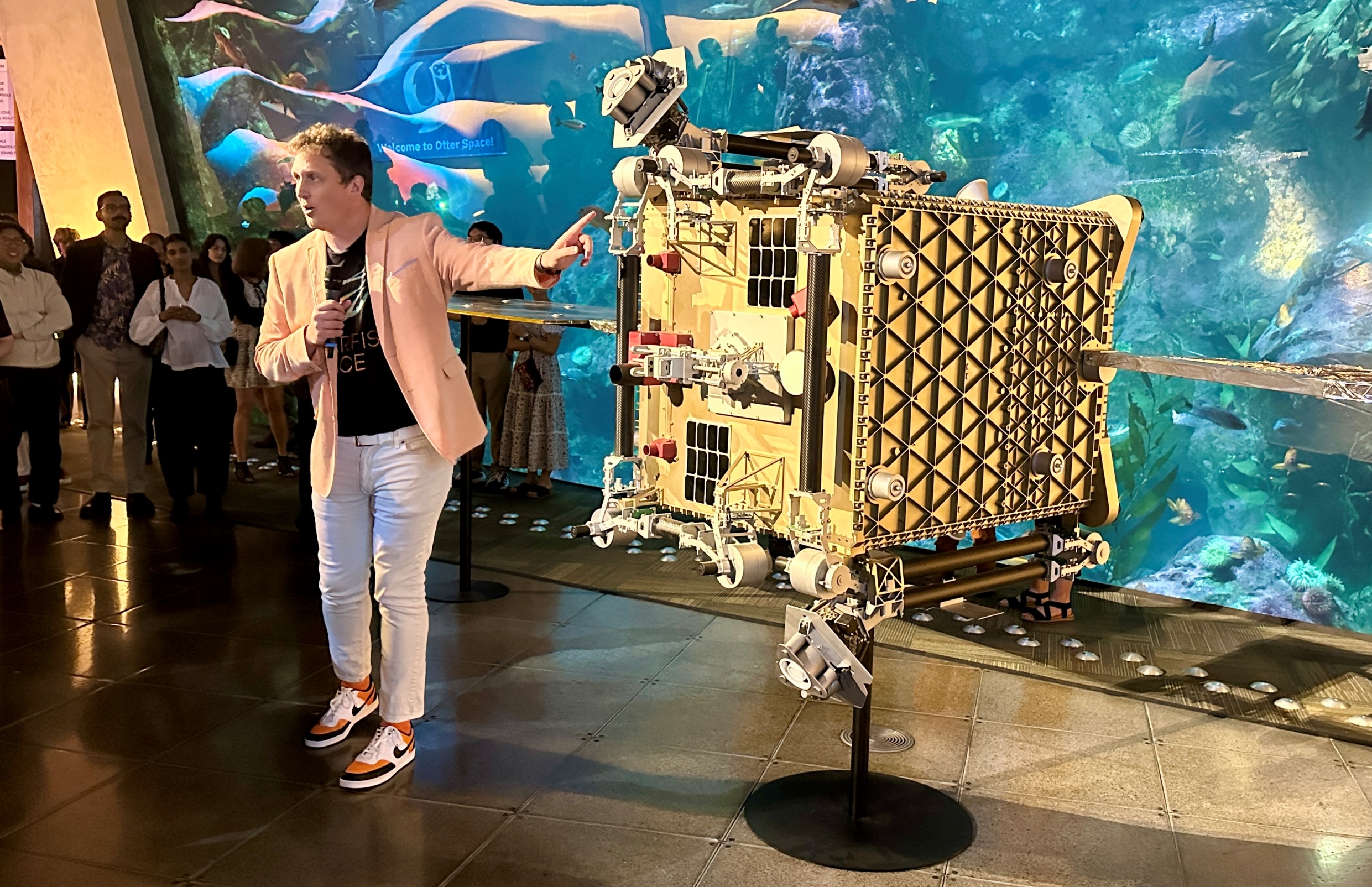 Austin Link and Otter mockup at Seattle Aquarium celebration