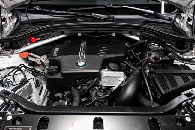 Bmw engine oil leak repair cost