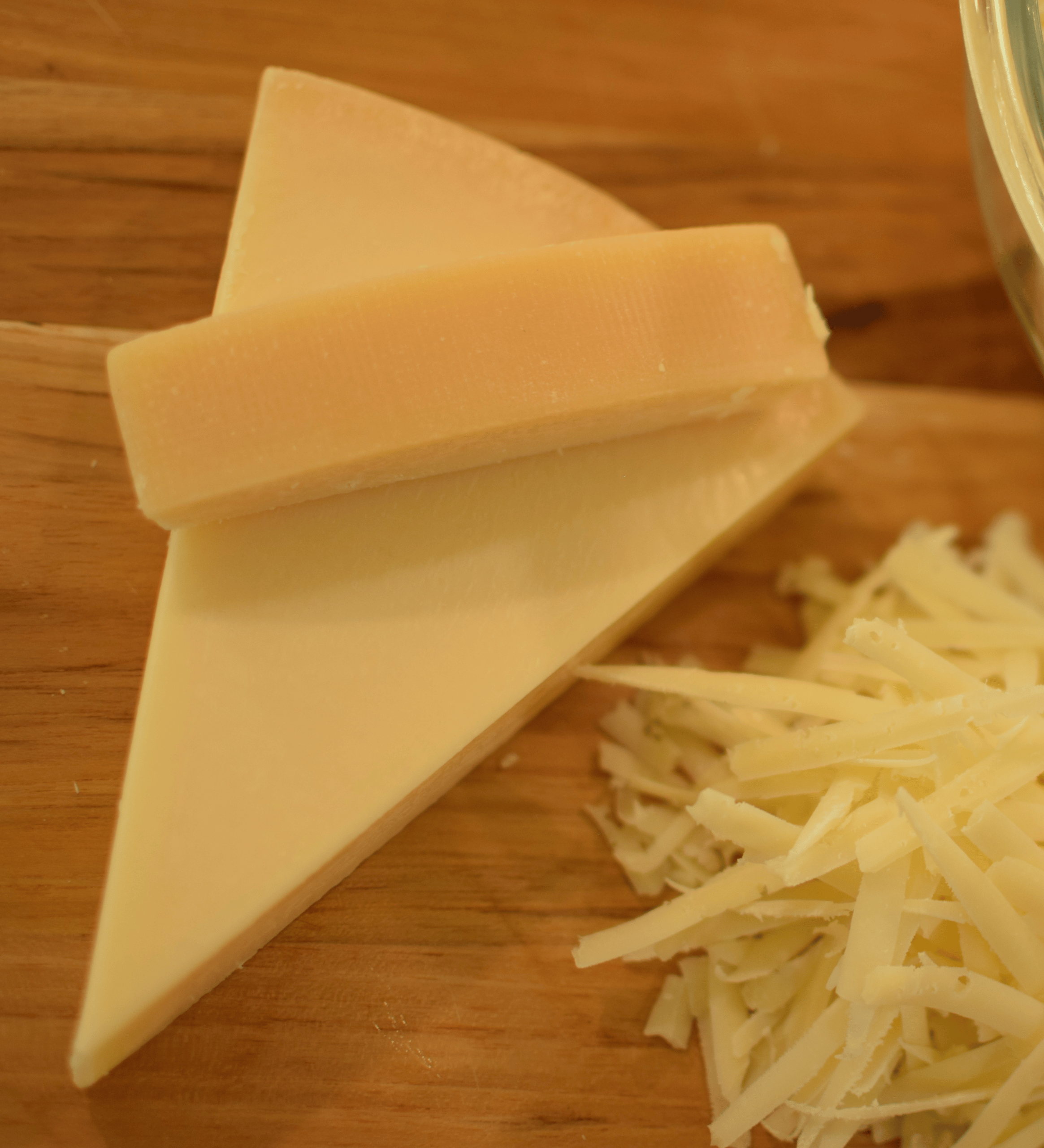 Freshly grated parmesan cheese ready to be added to a comforting fall pasta dish.