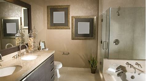 bathroom design with gray cabinets and tan countertop. tan walls and shower with glass doors.