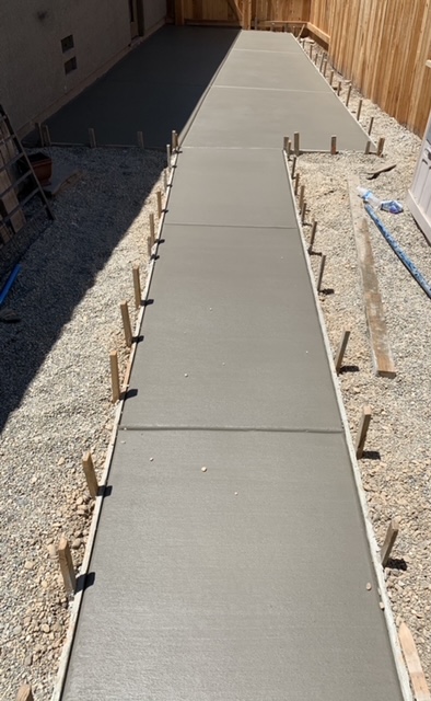 Residential concrete sidewalk with a broom finish