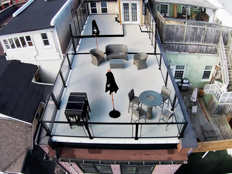 Why Rooftop Decks Need Different Decking Than Ground-Level Patios