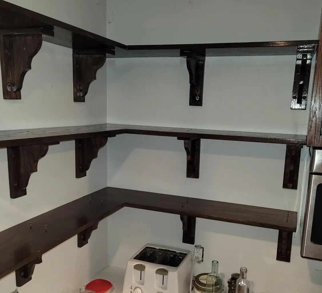 Dark Walnut stained corner kitchen open shelves with DIY brackets