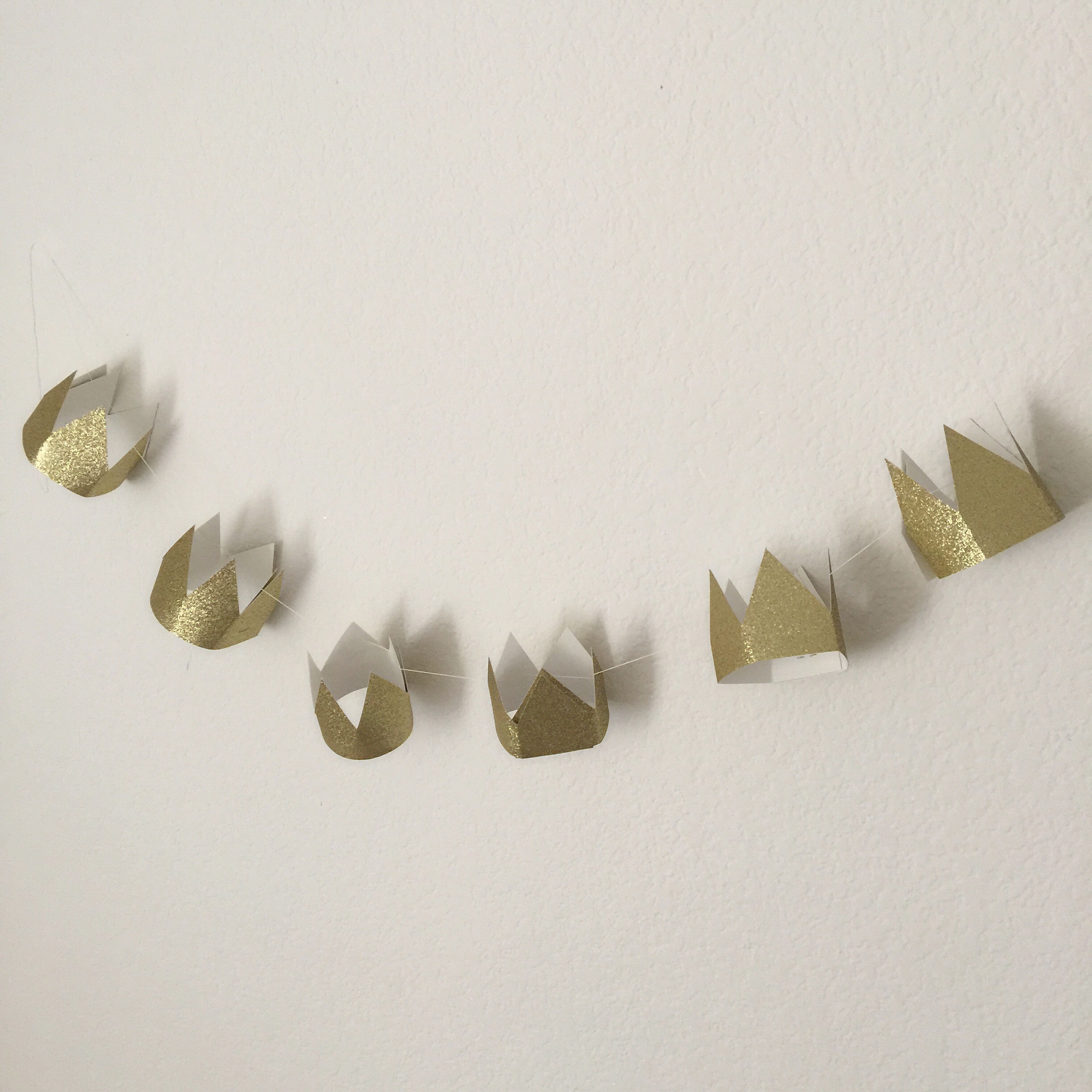golden sparkle crowns.