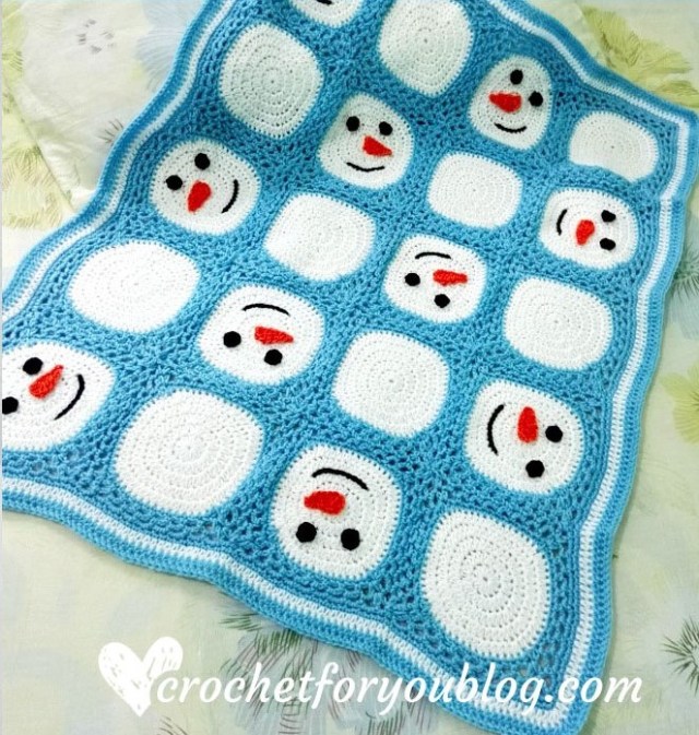Here is a roundup of free crochet blanket, throw, and afghan patterns to make for Christmas curated by Crafting Happiness.