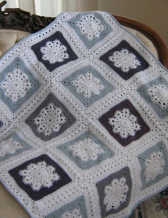 Here is a roundup of free crochet blanket, throw, and afghan patterns to make for Christmas curated by Crafting Happiness.