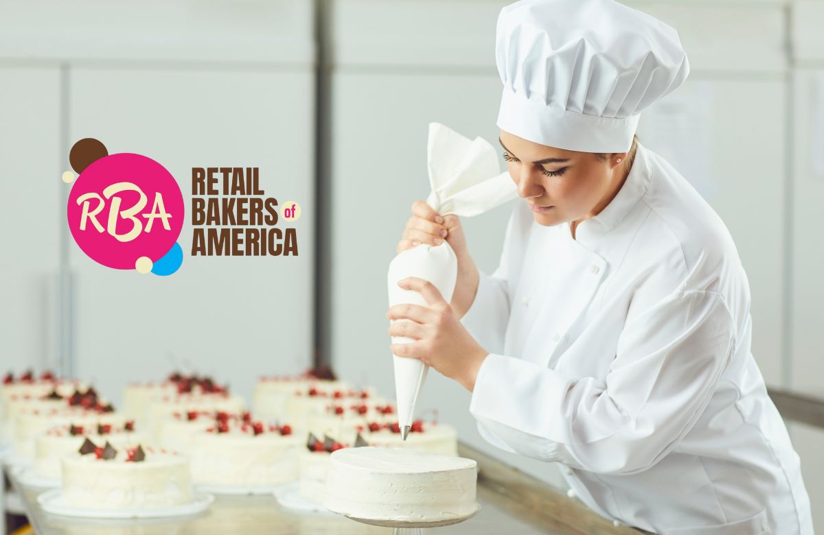 RBA baker taking certification exam, icing a cake