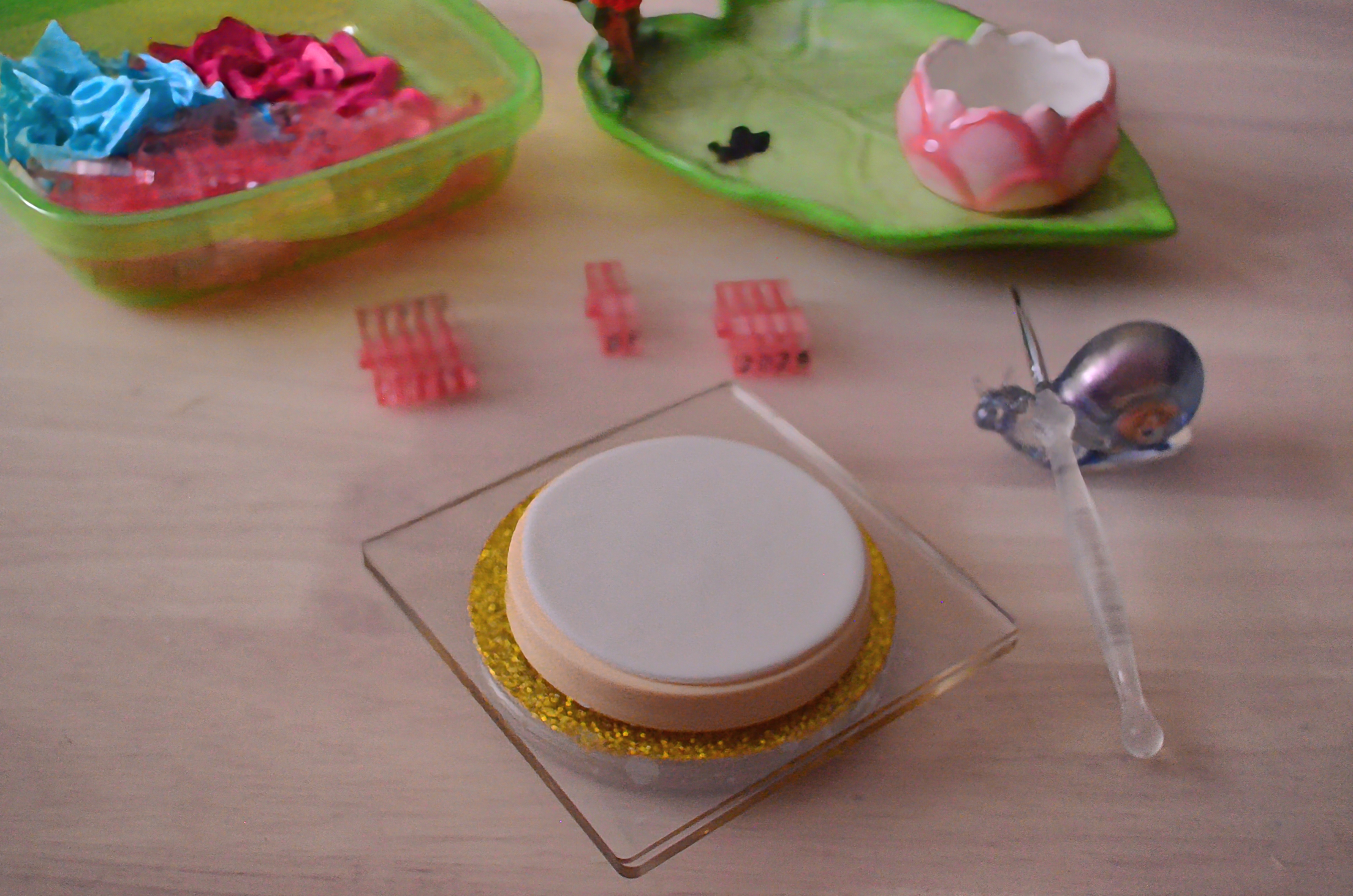 Start with a baked cookie covered with royal icing or fondant.
