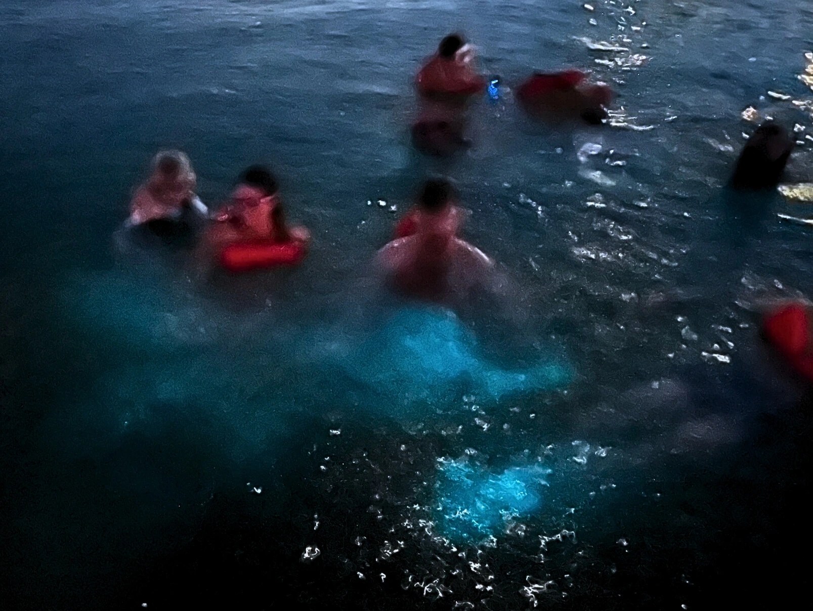 Bioluminescence glow from stirring the water in Bioluminescent Bay, Grand Cayman.