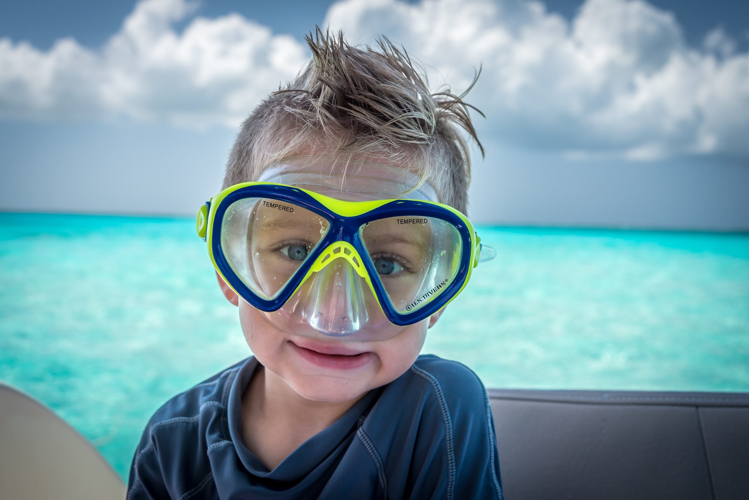 child getting ready to snorkel in Grand Cayman