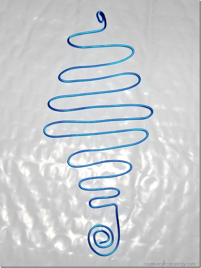 Wire and bead bookmarks CreativeCynchronicity.com blue craft wire formed into a rounded zigzag shape to become part of a bookmark