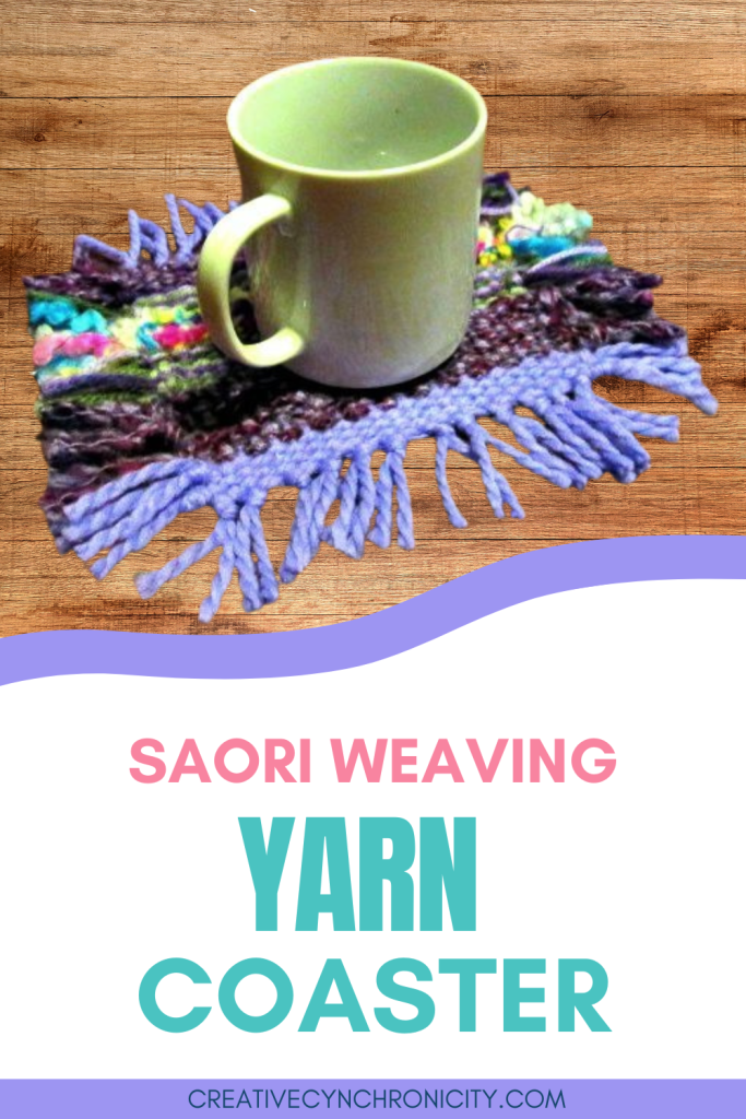 Text reads Saori Weaving Yarn Coaster. Picture shows coffee mug sitting on colorful mug rug woven out of yarn