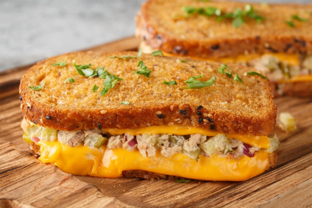 Toasted tuna melt sandwich with melted cheese
