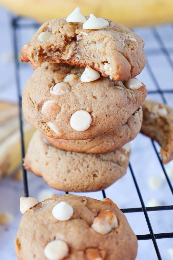 Close-up of a soft banana pudding cookie with white chocolate chips