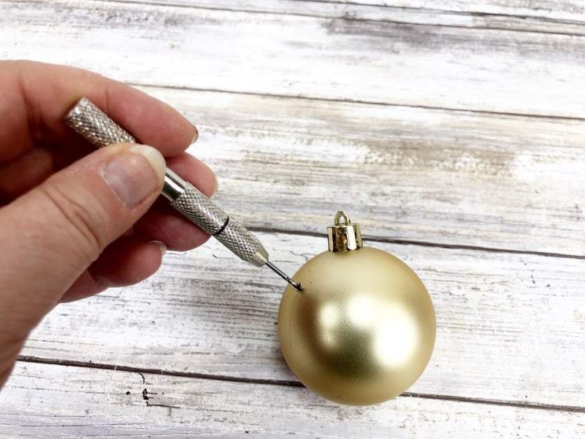Golden Snitch Christmas Ornament with Dollar Tree Supplies by Creatively Beth #creativelybeth #harrypotter #goldensnitch #dollartree #christmasornament #crafts #diy
