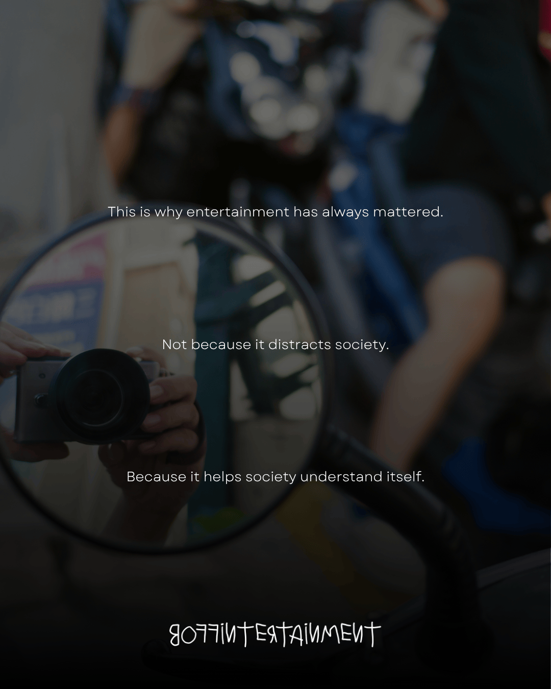 A camera reflected in a mirror with text overlay discussing the significance of entertainment in understanding society.