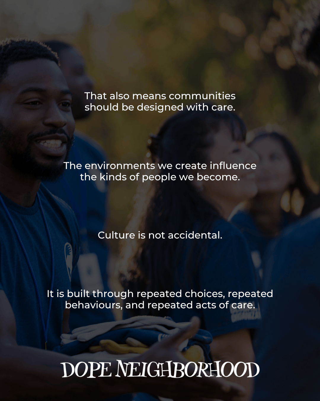 A diverse group of people engaged in a community service activity, sharing smiles and wearing matching blue shirts. Text overlay discusses the importance of designing communities with care and the impact of environments on culture.
