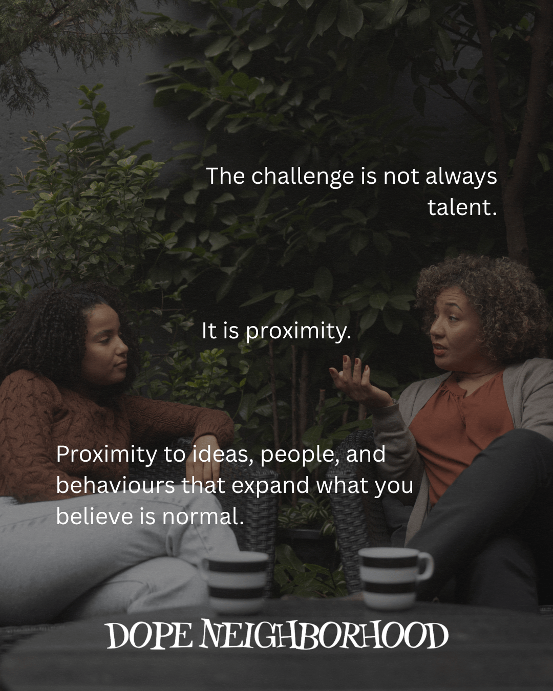Two women engaged in a conversation in a cozy outdoor setting among greenery, with a message about the importance of proximity to ideas and people.
