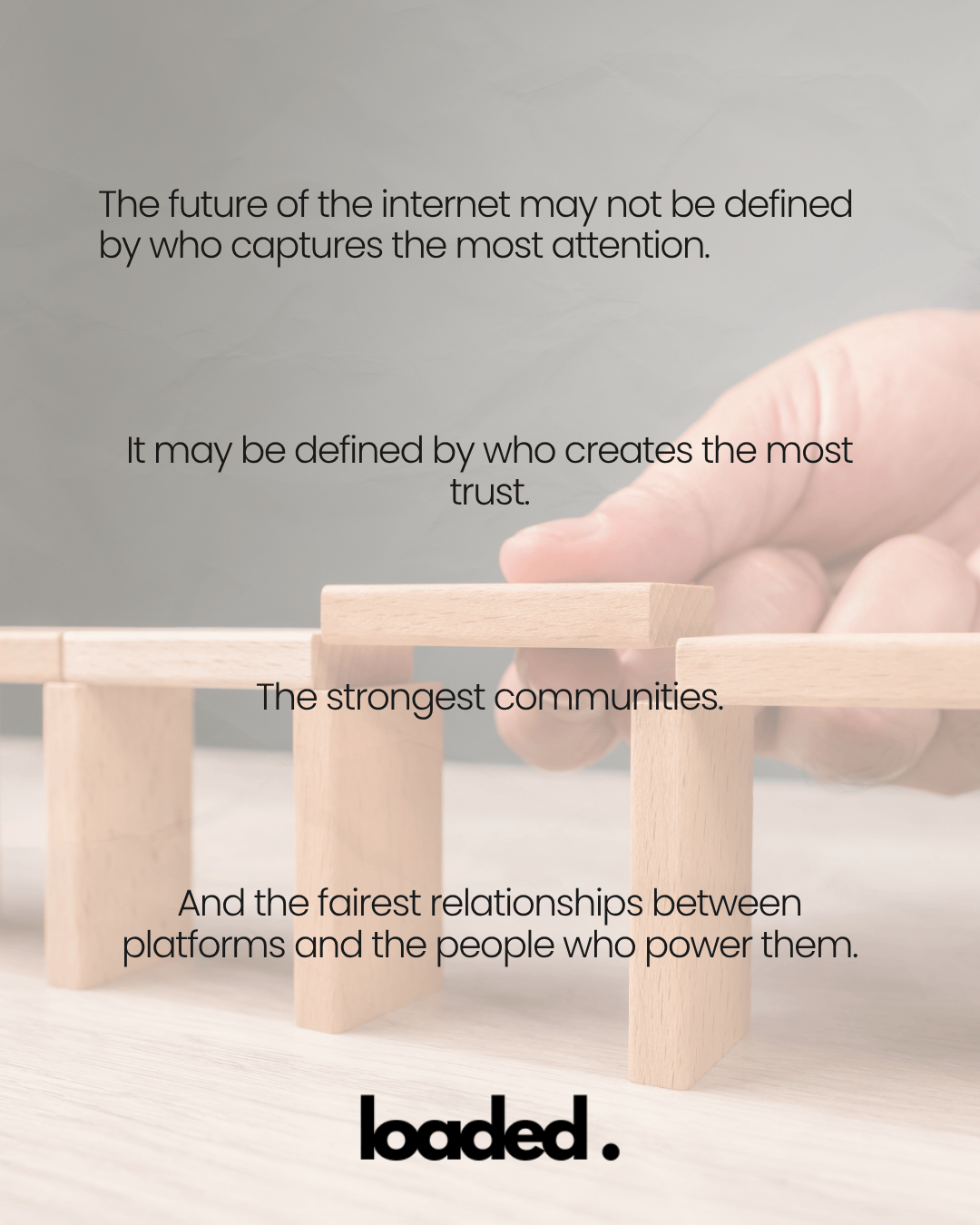 A close-up image of wooden blocks forming bridges, with overlaid text discussing the future of the internet, emphasizing trust, community, and fair relationships.