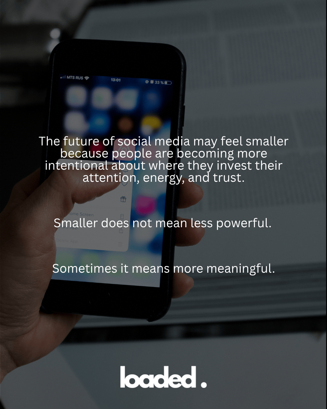 A hand holding a smartphone displaying a social media interface, with text overlay discussing the future of social media and its evolving significance.