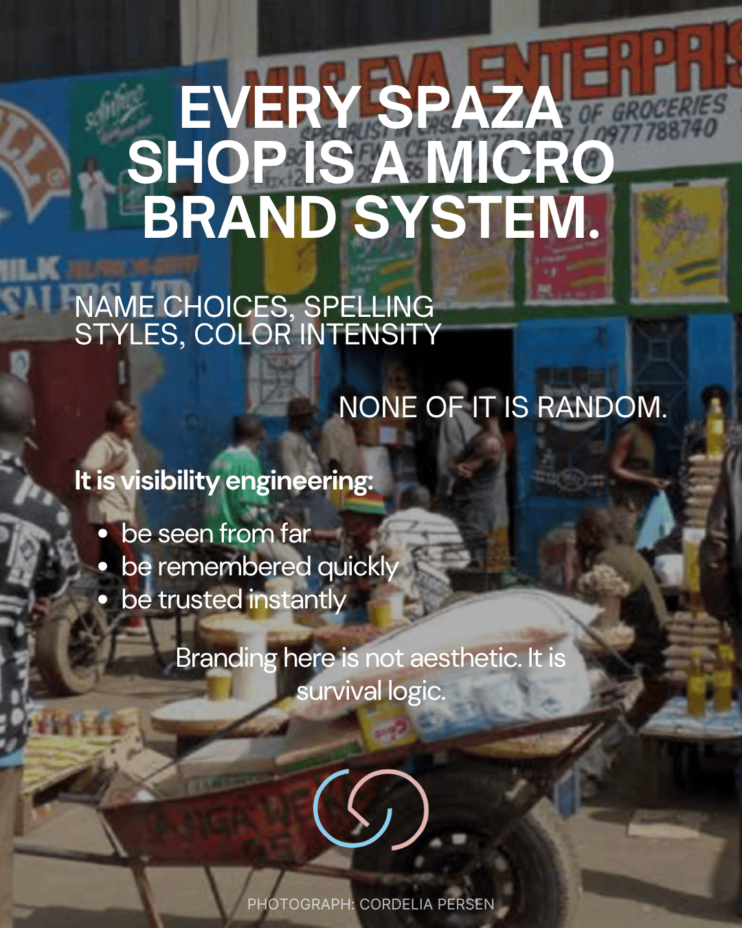 A busy spaza shop with colorful signage and people interacting in front of it, illustrating the concept of micro branding and visibility engineering.