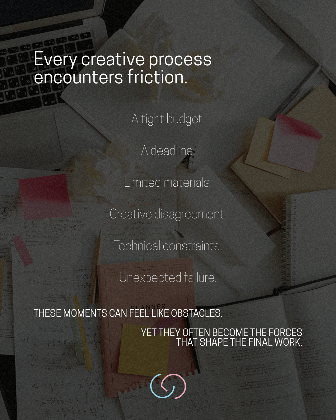 A cluttered workspace featuring a laptop, notebooks, sticky notes, and crumpled papers, illustrating the challenges faced in the creative process.