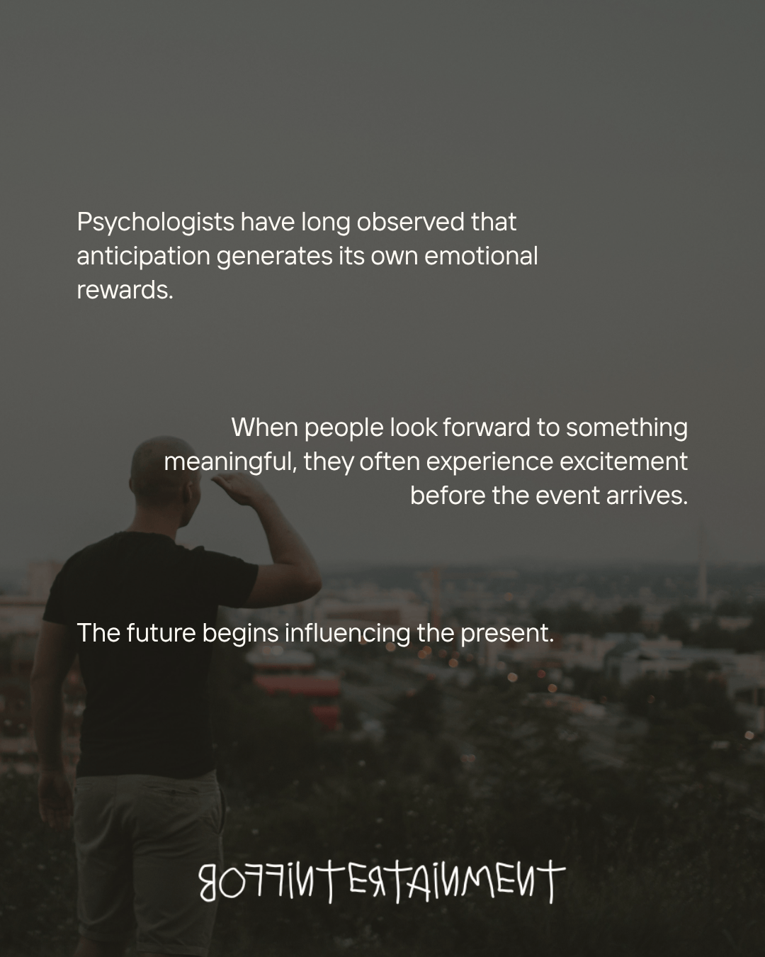A person standing with their back to the camera, overlooking a cityscape at dusk, with text overlay discussing the emotional rewards of anticipation.