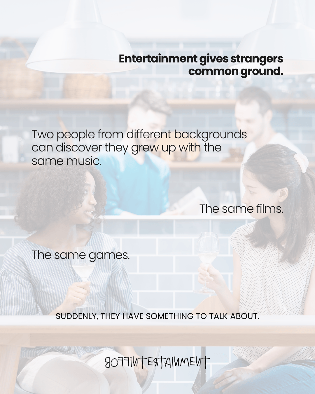 A diverse group of people enjoying conversation in a casual setting, with a focus on two women sharing drinks, symbolizing how entertainment connects individuals from different backgrounds.