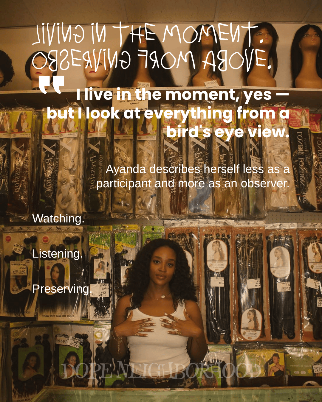 A woman stands in front of a wall displaying various types of wigs and hair extensions, with a thoughtful expression. Text overlay includes a quote about living in the moment and observing from a distance.