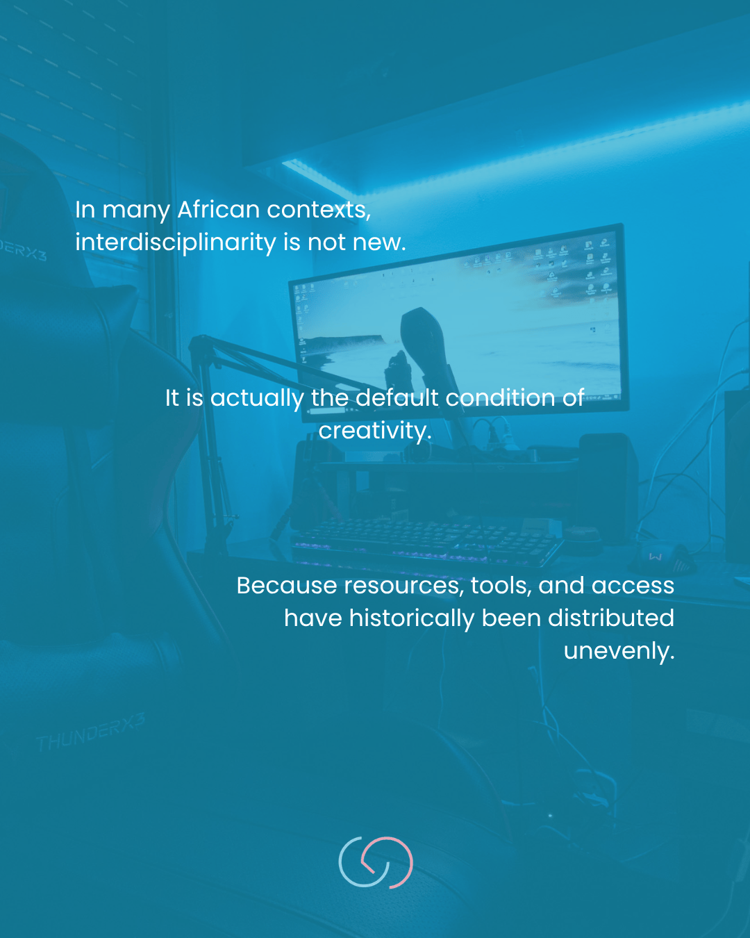A workspace featuring a gaming chair and a computer setup with a monitor displaying a serene landscape. Text overlays discuss the concept of interdisciplinarity in African contexts and the uneven distribution of resources.