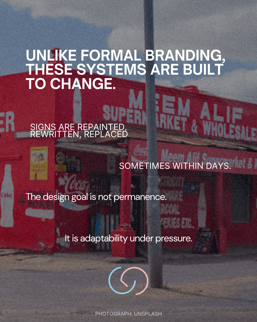 A red supermarket storefront with hand-painted signs, showcasing text about adaptability and change in branding and design. The image emphasizes the temporary nature of signage, with some messages focusing on quick alterations.