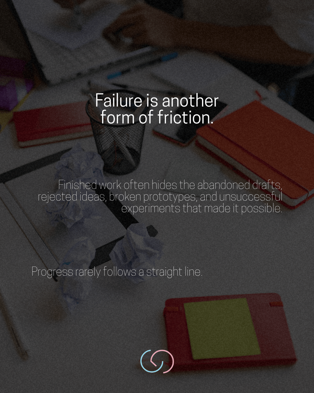 A desk scene featuring papers, crumpled notes in a trash can, and colorful notebooks, with inspirational text about failure and progress overlaying the image.
