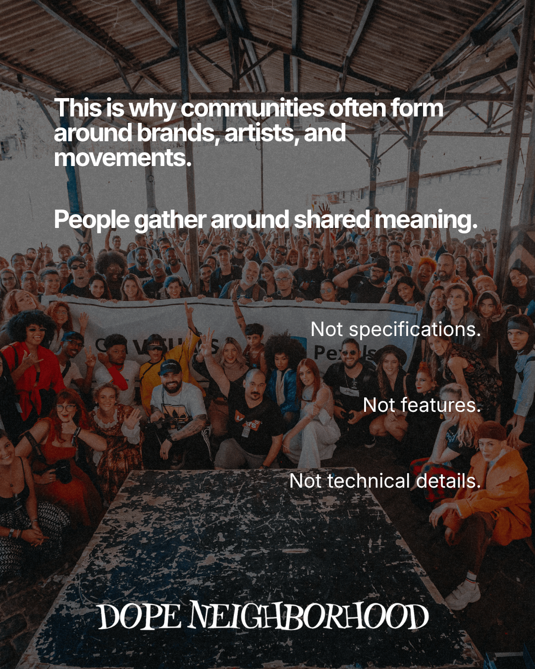 A diverse group of people gathered in a community space, sharing a moment of connection and unity, with text highlighting the importance of community around brands and movements.