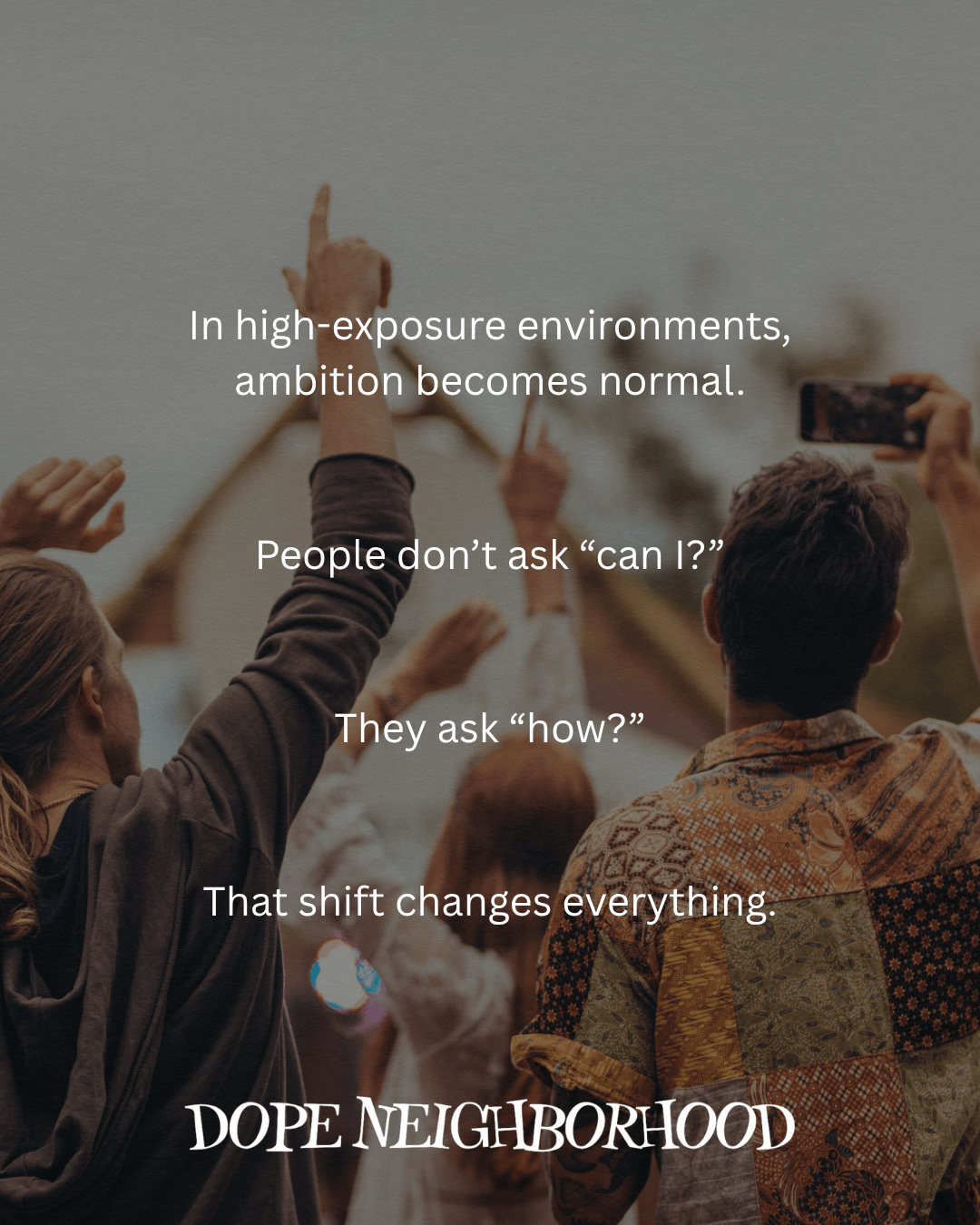 An inspirational quote graphic featuring people with raised hands in a crowd, discussing ambition and mindset shifts in high-exposure environments.