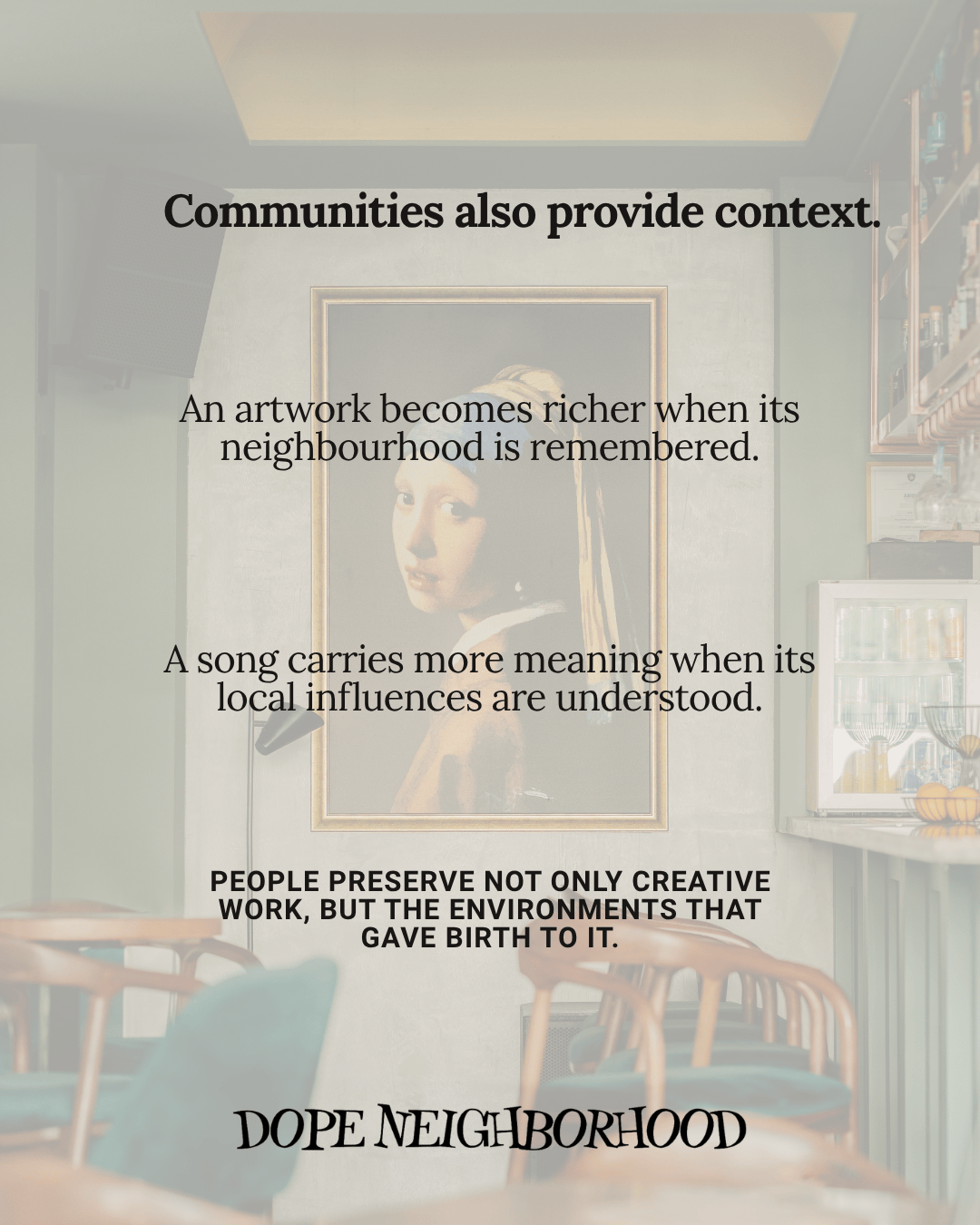 A cozy interior featuring a framed artwork resembling a famous painting, with textual quotes about communities, art, and music on a well-decorated wall.