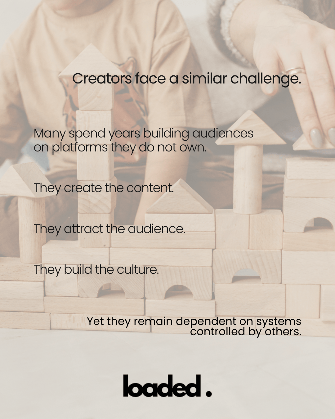 An image of a child building with wooden blocks, with text discussing the challenges creators face in building audiences on platforms they do not own.