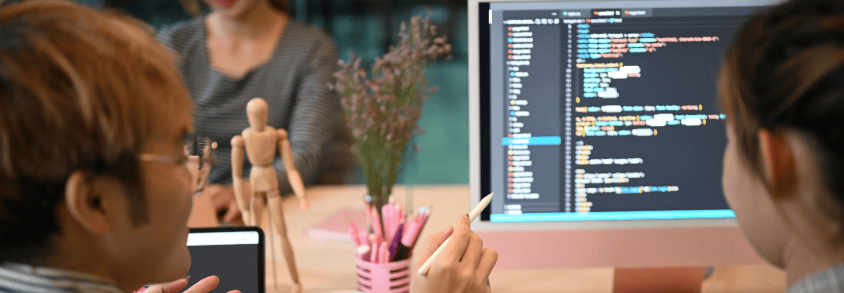 CX_Designers_working_through_code