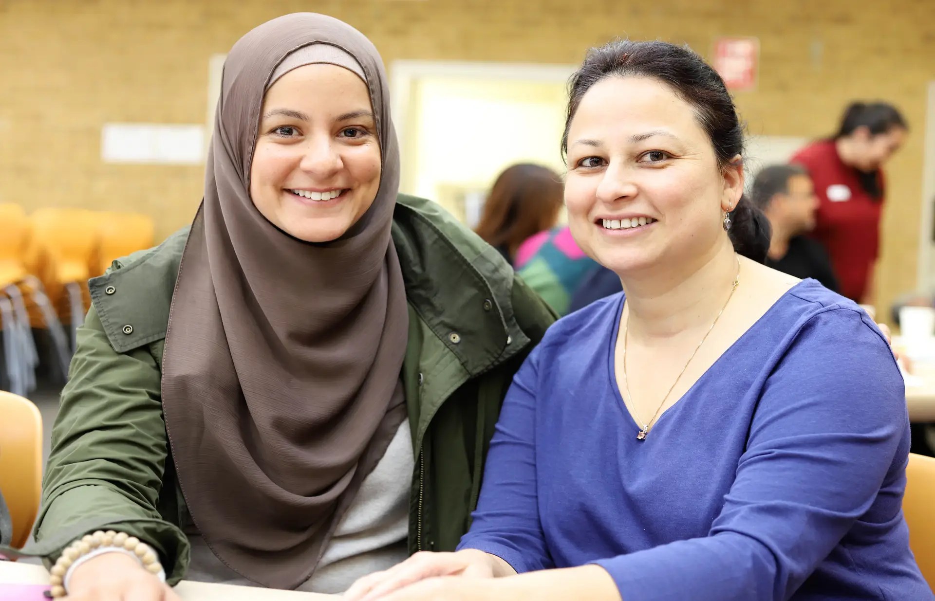 CRED Consulting, Two women smiling
