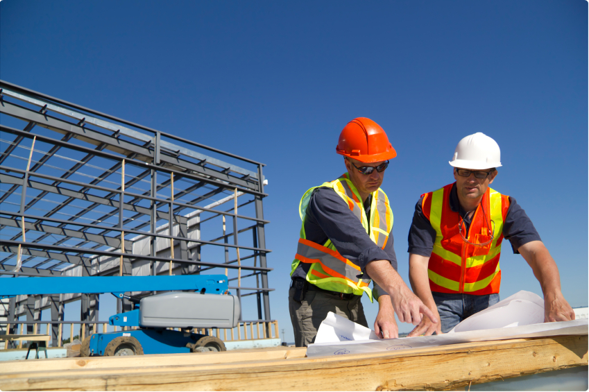 construction crew performing commercial construction services on active jobsite