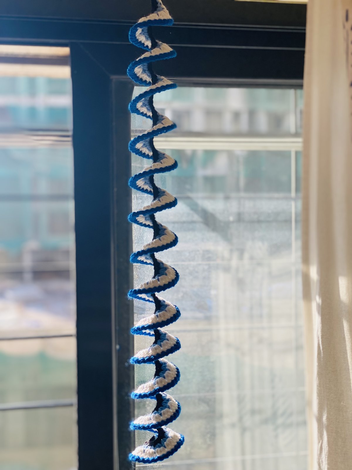 Handmade evil eye crochet windspin
