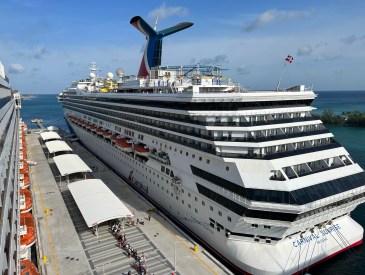 Cruise Ships - Cruise Ship Carnival Sunrise Leaves the Port of Nassau Bahamas and Heads Out to Sea